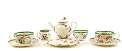 A Royal Worcester Old Bow pattern reproduction part tea service, comprising tea pot, milk jug, sugar bowl, two cups and saucers and a side plate.