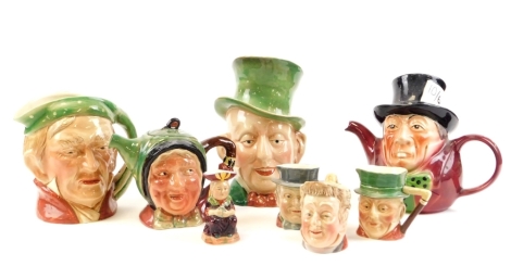 A group of character jugs, to include a Beswick ware Macauber character jug, a Beswick ware Scrooge large character jug, a Troywood Staffordshire teapot, a Beswick ware teapot numbered 169, two miniature Beswick character jugs to include Pickwick numbered