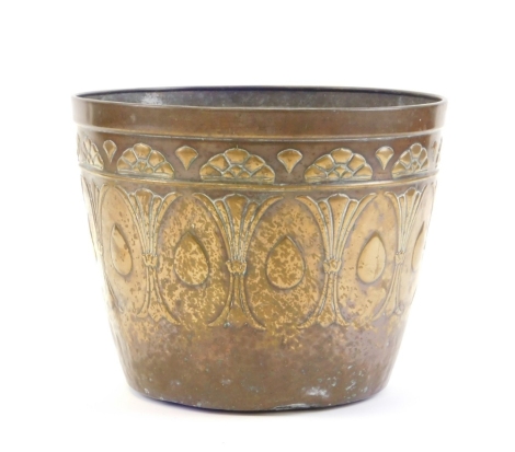 An Art Nouveau style brass planter, 21cm high, 26cm diameter.