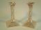 A pair of late Victorian silver candlesticks