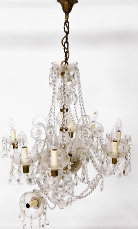 A three tier cut glass chandelier, with eight arm branch and various droplets AF, the chandelier section 70cm high x 70cm wide.