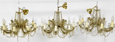 Three matched eight branch glass and gilt chandeliers, 40cm high, 54cm wide.