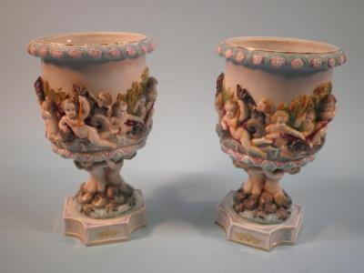 A pair of late 19thC German porcelain urns