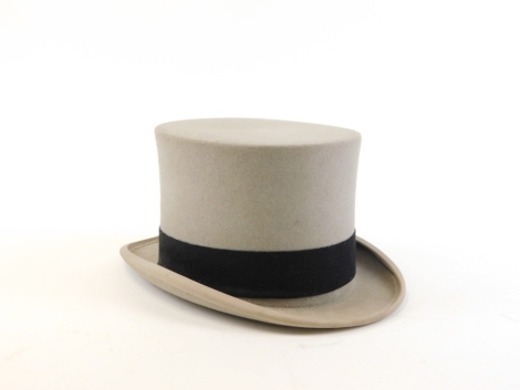 A grey gentleman's top hat, in case, the top hot by Woodrow Piccadilly London, in a plywood case, the internal diameter 16cm x 20cm.