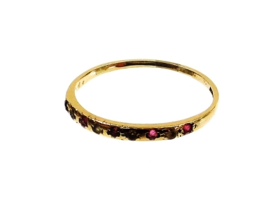 A 9ct gold dress ring, of half hoop design, set with tiny stones and rubbed/bent overall, 1g all in.