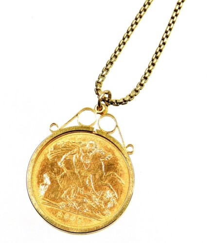 An Elizabeth II full gold sovereign, pendant and chain, the sovereign dated 2007 in a 9ct gold pendant mount, on a 9ct gold elongated box link chain, 48cm long, 15.2g all in.