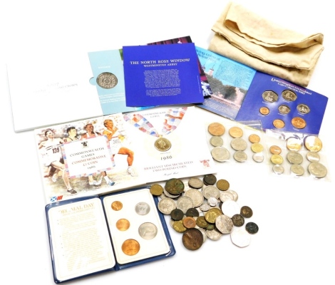 Various coinage and presentation cased coins, to include the 2007 Diamond Wedding Crown presentation pack, The United Kingdom uncirculated coin collection 1982, a sleeve for The Commonwealth Games 1986 but lacking contents and various loose collectors coi