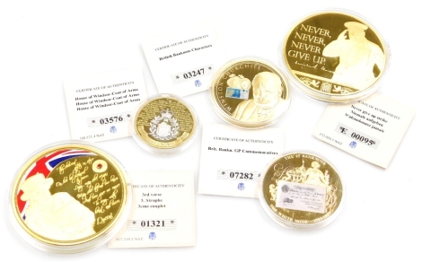 A group of Windsor Mint collectors coins, to include Never Give Up Strike E00095, Third Verse 01321, House of Windsor Coat of Arms 03576, Brit Banking GP Commemoratives 07282 and British Bank Note Characters 03247. (5)