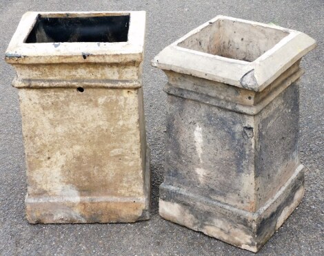 Two reconstituted stone chimney pots, each with a rectangular top, 22cm high, 32cm wide, the other 53cm high, 30cm wide.