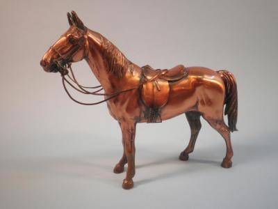 A copper figure of a race horse