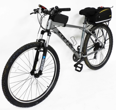 A Carrera SR Suntour gent's mountain bike, with Shimano fourteen speed gears, saddle bag, phone pouch, light, etc. Note: VAT is payable on the hammer price of this lot at 20%.