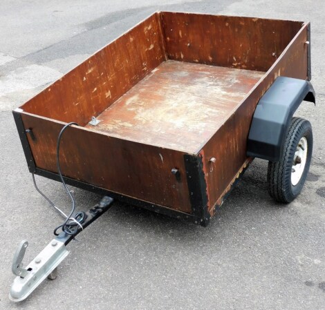 A single axle trailer.