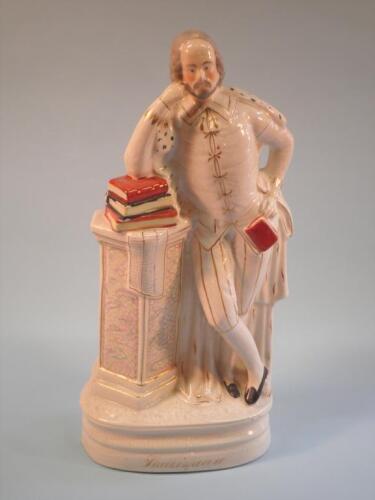 A 19thC Staffordshire flat back figure of William Shakespeare standing