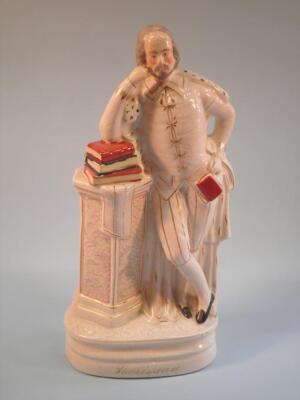 A 19thC Staffordshire flat back figure of William Shakespeare standing