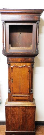 A late 19thC mahogany longcase clock case, the square set hood above a single door on a stepped base, 206cm high, 54cm wide, 24cm deep.