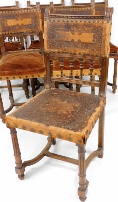 A set of six 19thC carved oak and embossed leather dining chairs, the back panel each inset with a leather depiction of flowers and leaves, with buttoning details, on pillar columns with cushion seats on tapered legs, 95cm high, 44cm wide, 42cm deep. - 2