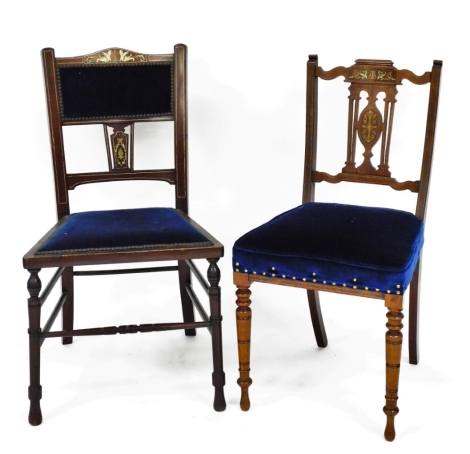 Two Edwardian bedroom chairs, to include one with a marquetry inlaid back on a blue velvet seat, on tapered stem legs, 87cm high, 42cm wide, 44cm deep, together with a similar example with similar marquetry banding and a blue velvet button back top panel 