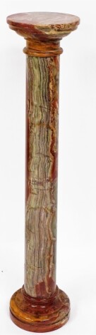 An onyx column, with green red and orange detailing, 110cm high x 24cm wide.