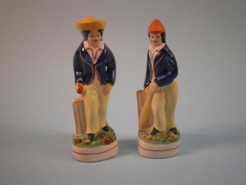 A pair of late Staffordshire figures of cricketers