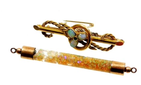 Two items of opal set jewellery, to include an Edwardian opal set bar brooch with three point clover set with opal, with a central green stone, yellow metal stamped 15ct, 4.5cm wide, together with a opal pendant section with yellow metal ends unmarked, 5.