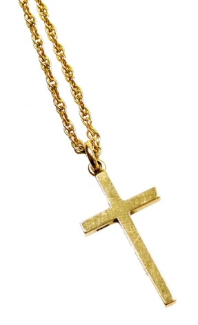 A 9ct gold crucifix pendant and chain, the plain pendant on a fancy link chain, 40cm long, 4.7g.