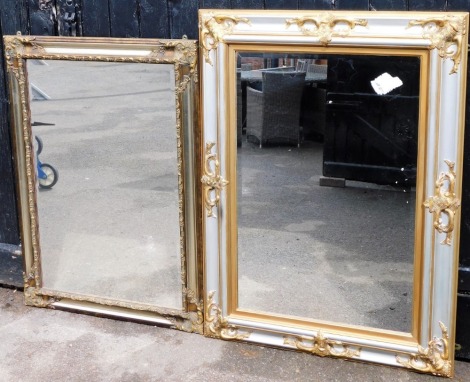 Two silvered wooden framed rectangular wall mirrors, with shell applied scroll corners, with silvered colour finish, 108cm high, 77cm wide and another 120cm high, 90cm wide. (2)