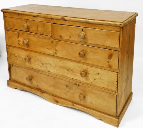 A Victorian stripped pine chest, of two short and three long drawers, with rounded handles on plinth base, 94cm high, 139cm wide, 46cm deep.