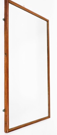 A large rectangular pine framed wall mirror, 153cm x 93cm.