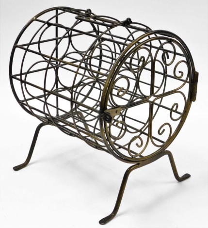 A seven bottle metal wine rack, on two splay legs, 42cm high, 30cm wide, 37cm deep.