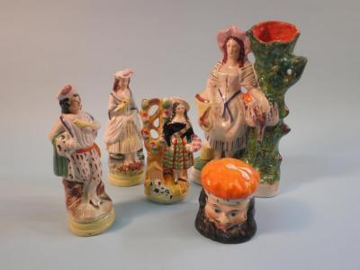 A 19thC Staffordshire pottery flatback figure in the form of a Scottish lady