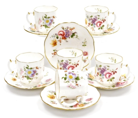 A group of Royal Crown Derby Derby Posies pattern cups and saucers, comprising six cups and six saucers.