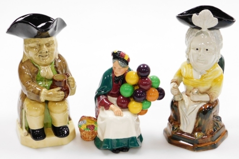 A group of character jugs and ornaments, to include a Royal Doulton Old Balloon Seller and two Woods & Sons character jugs including Martha Gunn. (3)