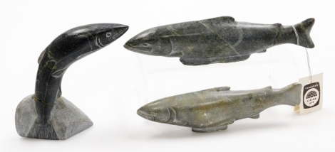 Three Inuit carved figures of fish, 14cm high, 24cm wide and 21cm wide. (AF)