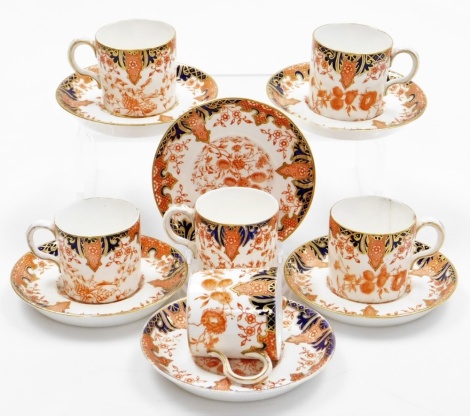 A set of Royal Crown Derby old imari pattern six coffee cans and saucers.