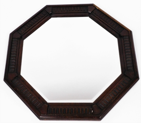 A mahogany framed octagonal wall mirror, with reeded borders, 64cm wide.