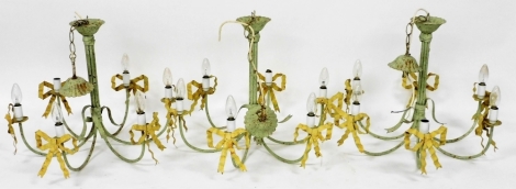 Three painted metal hanging chandeliers, in a green and yellow finish with bow detailing, each six branch, 49cm high, approx 65cm wide.