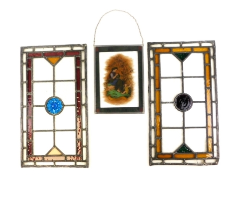 Three stained glass panels, to include a pair with coloured panels, 47cm x 25cm, and another German panel, marked Furbling, 26.5cm x 19cm. (3)