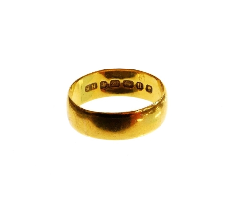 A 22ct gold wedding band, of plain design, Birmingham 1887, ring size K½, 3.7g all in.