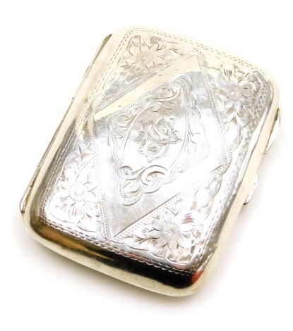 A George V silver cigarette case, with engine turned decoration, of flowers and leaves, bearing initials CS?, Chester 1913, 1½oz.