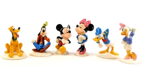 Six Royal Doulton Mickey Mouse collection figures, Donald Duck MM3, Mickey Mouse MM1, Goofy MM5, Pluto MM6, Minnie Mouse MM2, and Daisy Duck MM4, boxed, part of the 70 year collection. (6)