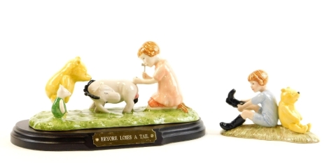 Two Royal Doulton Winnie the Pooh collection figures, to include Christopher Robin and Pooh and Eeyore looses a table, limited edition 2479 certificate, both boxed. (2)