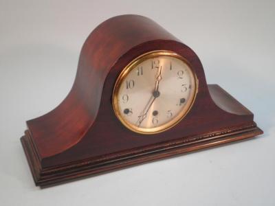 A mahogany "Napoleon hat" mantel clock with Westminster chimes