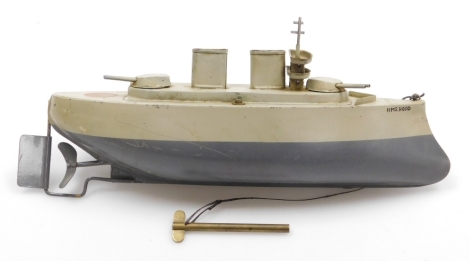 A Sutcliffe vintage tin plate clockwork model of 'H.M.S Hood', 33cm long, with key.