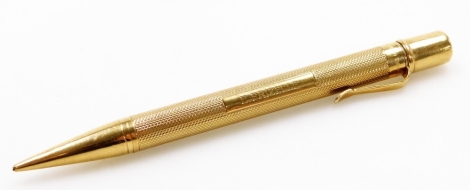 A Sampson Mordan & Co 9ct gold Everpoint propelling pencil, with engine turned decoration and engraved E Frizelle.