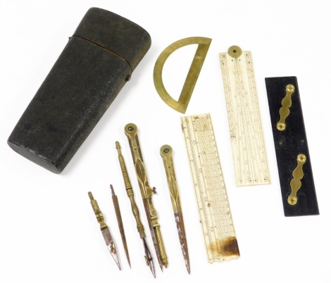 A cased drawing instrument set, with makers stamp W and S Jones Opticians and Co London, with various implements in fitted slots, to include rule, etc., 17cm high.