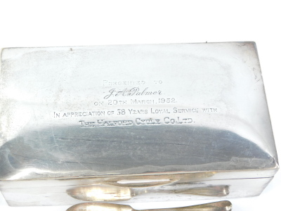 A George VI silver rectangular cigarette box, the hinged lid engraved 'presented to J A Palmer on 20th March 1952 in recognition of 38 years loyal service with the Halford Cycle Company Limited,' with cedar lined interior, a George VI commemorative teaspo - 2