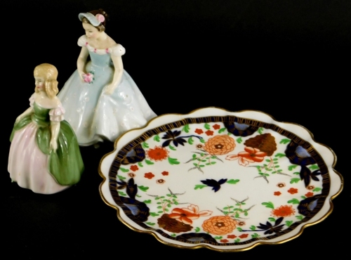 Two Royal Doulton figures of Penny and The Bridesmaid, and a Shelley Imari patterned plate decorated with flowers, etc. (3)