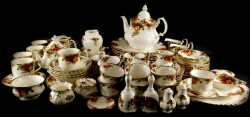 A large collection of Royal Albert Old Country Roses pattern porcelain, to include two teapots, cups, saucers, two circular boxes and covers, place mats, dinner plates, etc.