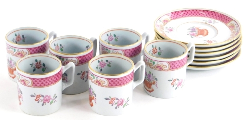 A Copeland Spode New Stone part coffee service, decorated in famille rose enamels in the oriental style with flowers, baskets, etc., comprising six saucers and six coffee cans.