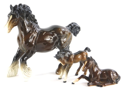 A Beswick ceramic figure of a horse, and two Beswick Foals, (3).